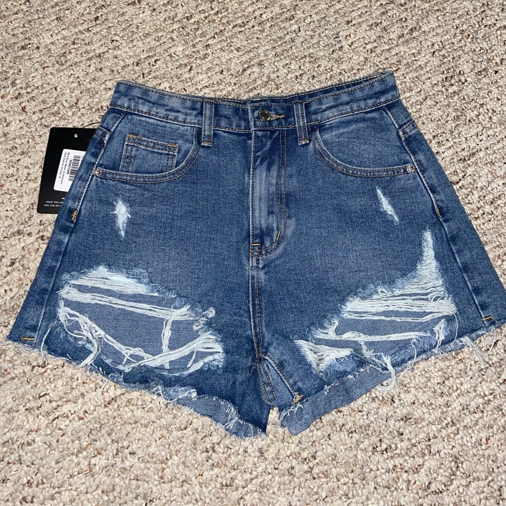 Prettylittlething mid wash distress jean shorts